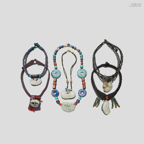 A group of six jade mounted pieces of costume jewelry Some Qing dynasty elements