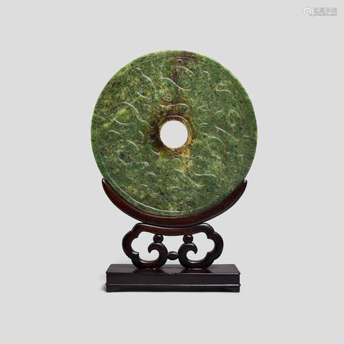 A large spinach green jade bi disc