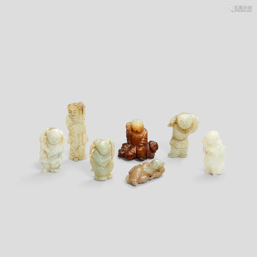 A group of seven jade figural carvings