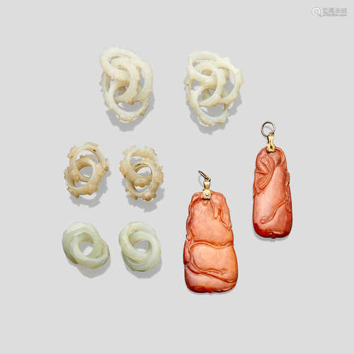 Three pairs of white jade earrings and two carnelian pendants