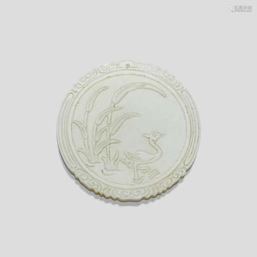 A circular white jade plaque