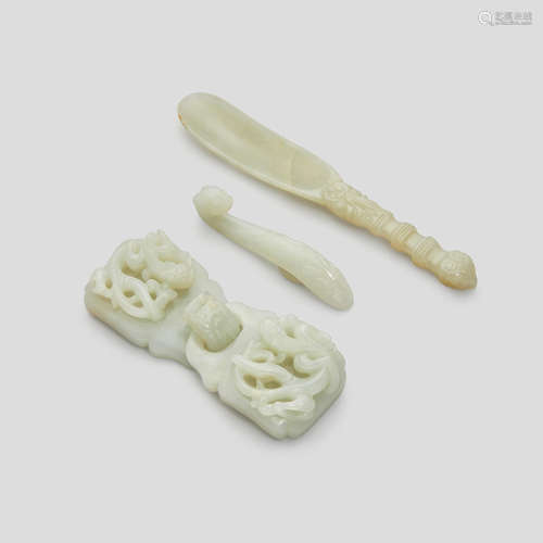 A GROUP OF THREE WHITE JADE CARVINGS 18th/19th century