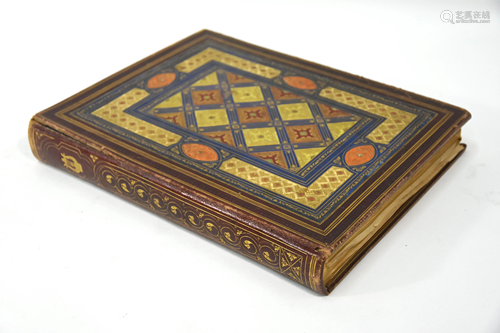 A Victorian album with decorative gilt morocco binding