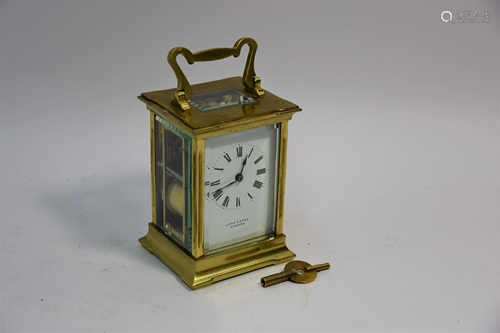 Lowe & Sons, Chester, a Brass carriage clock