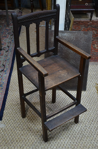 An antique oak child's high chair