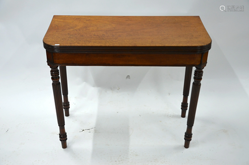 A George III mahogany card table in the manner of