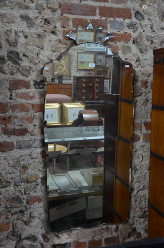 A vintage Finnish wall mirror, the elements bevel edged