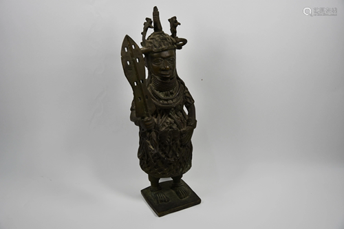 A Benin-style bronze figure of a heavily-armoured