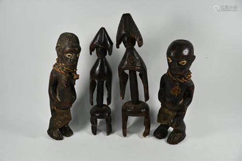 Two pairs of vintage African tribal carved wood male