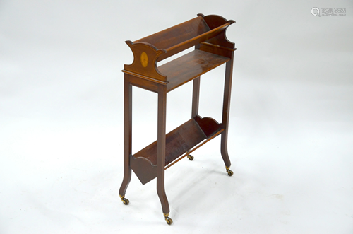 An Edwardian red walnut bookstand