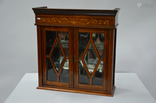 Inlaid rosewood wall cabinet in the Sheraton revival