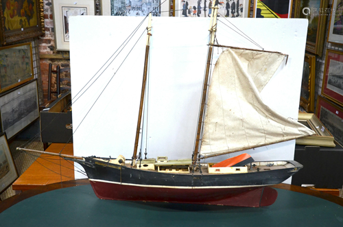 A scratch-built model of a two-masted fishing smack