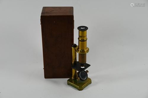 A Victorian brass field microscope in teak box