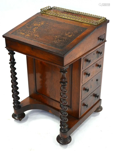 A Victorian rosewood Davenport desk