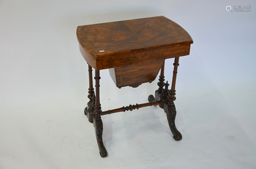 A Victorian walnut work table