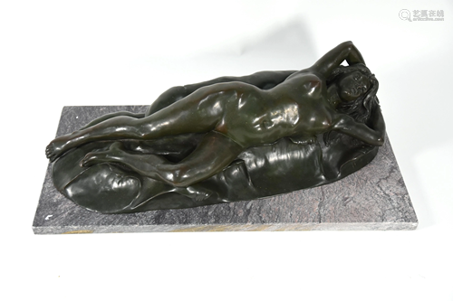 A green patinated bronze reclining female nude