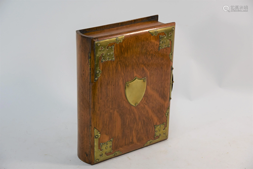 A Victorian oak humidor in the form of a book