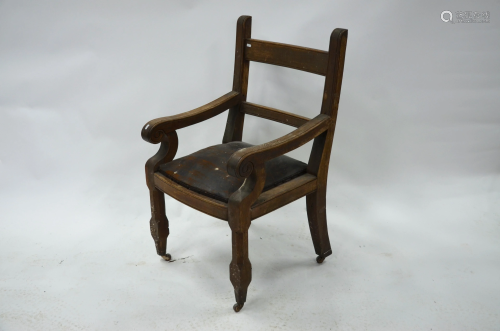 A substantial jointed oak framed antique open armchair