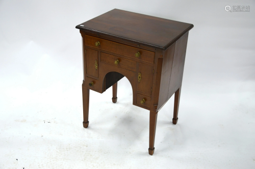 A Victorian mahogany kneehole side table