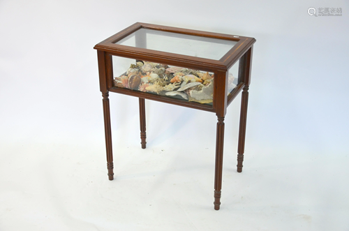 A cross banded mahogany vitrine table