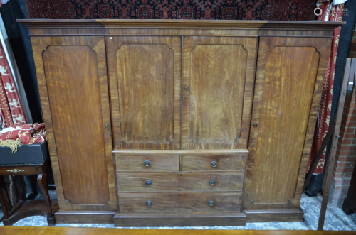 A Victorian mahogany breakfront wardrobe