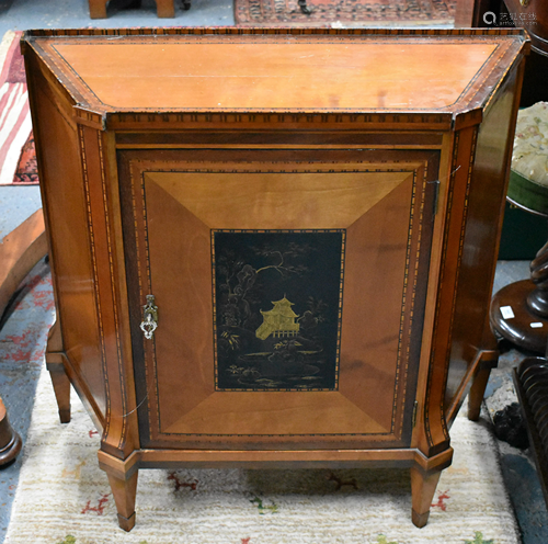 A 19th century satinwood cabinet