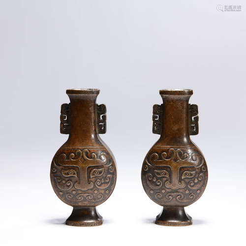 A Pair of Beast Face Copper Vases