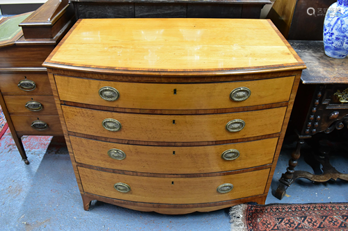 A George III bowfront cross-banded satinwood chest of