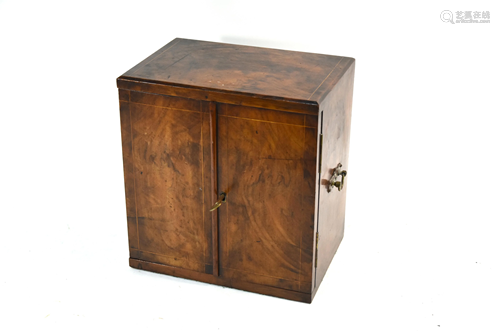 A Victorian mahogany three drawer table cabinet