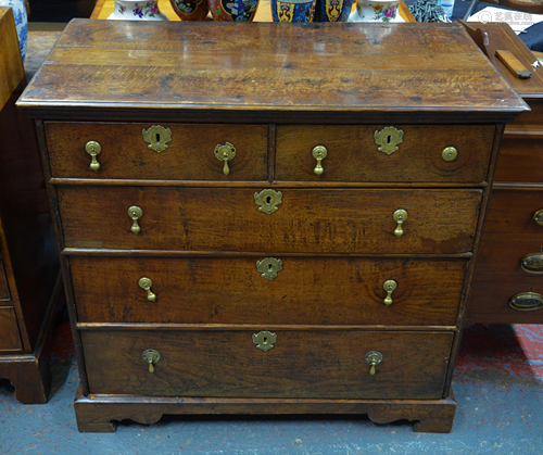 An 18th century oak chest of two over three long