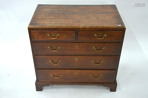 A George III oak caddy top chest ofm two short over