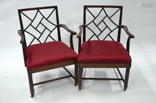 A companion pair of Chippendale design elbow chairs