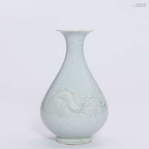 A Celeste Glazed Dragon Carved Porcelain Yuhuchun Vase