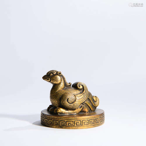 A Copper Phoenix Paper Weight