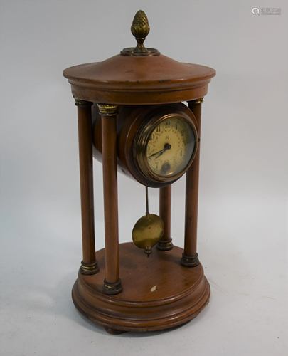 A French walnut portico clock