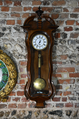 An antique walnut cased Vienna regulator clock