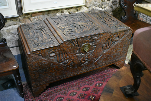 Large profusely relief carved oriental camphorwood