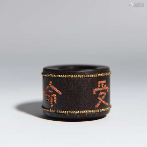 An Inscribed Aloeswood Thumb Ring