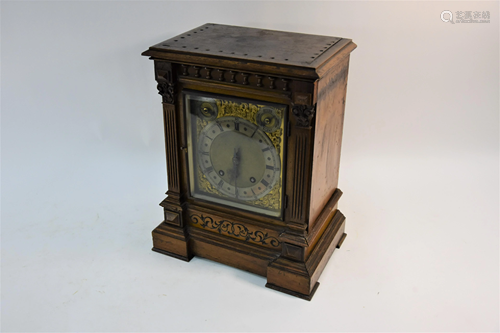 A late 19th century American oak cased mantel clock,