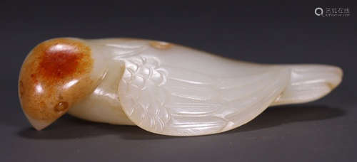 A HETIAN JADE CARVED BEAST SHAPED PENDANT