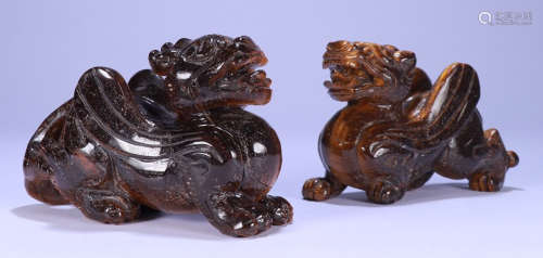 PAIR OF TIGER EYE STONE CARVED BEAST SHAPED PENDANT
