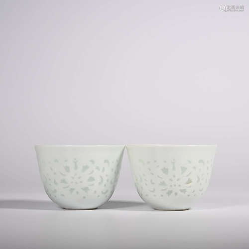 Qianlong of Qing Dynasty       A pair of carved white glaze cups