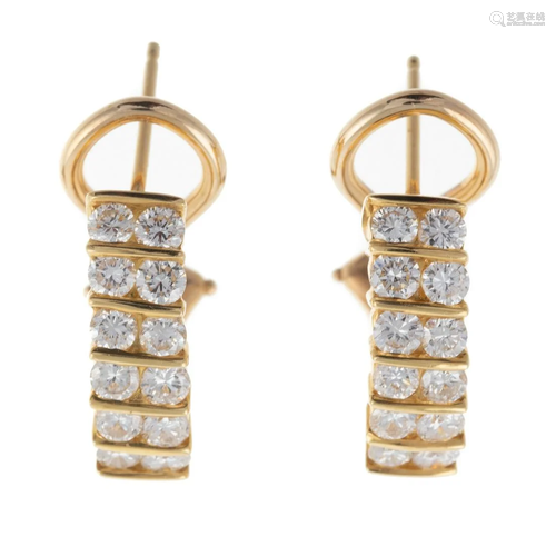 A Pair of Fine Channel Set Diamond Hoops in 18K