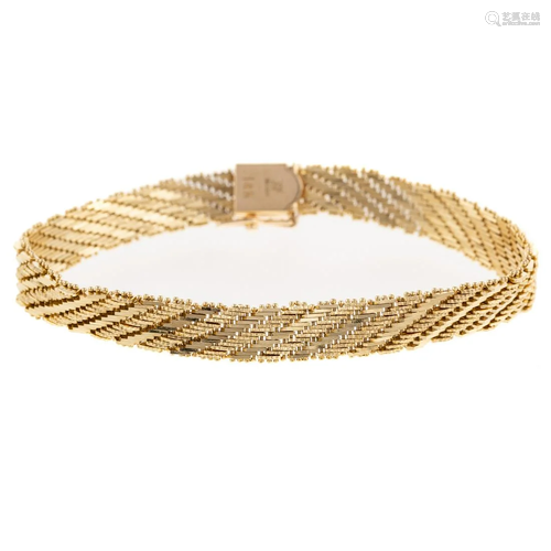 A Geometric Design Woven Bracelet in 14K