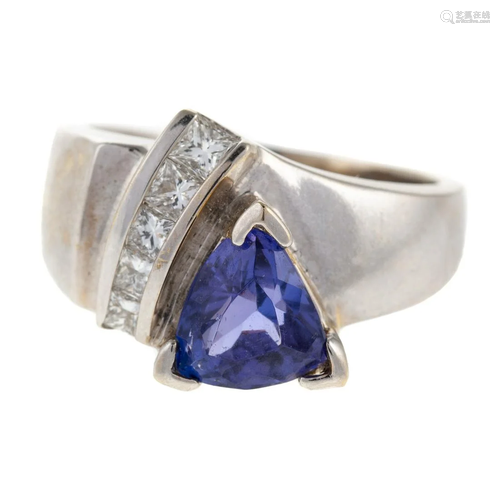 A Trillion Cut Tanzanite & Diamond Ring in 18K