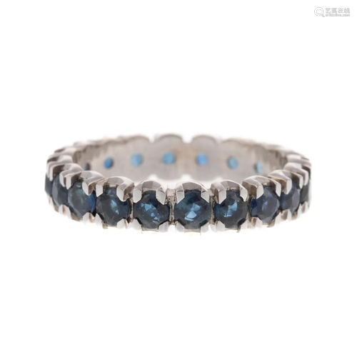 A Sapphire Eternity Band in 14K