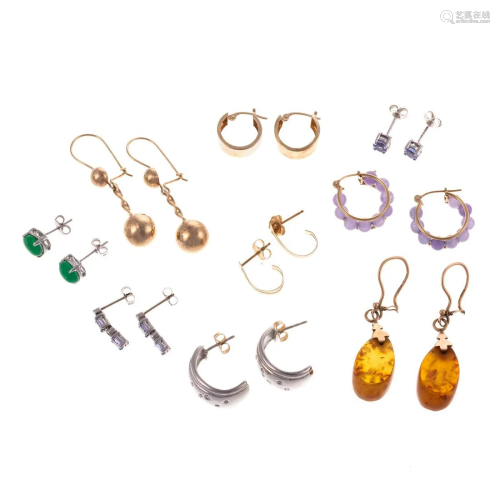 A Large Collection of Earrings in Gold