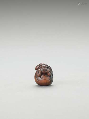 A Wood Netsuke Of Hotei Inside…