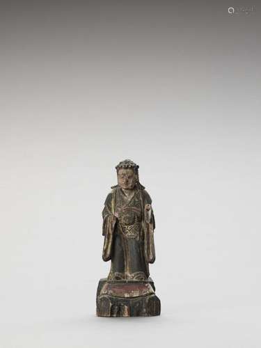 A Polychrome Wood Figure Of A …