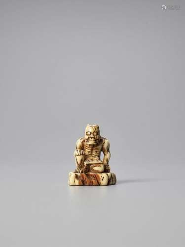 An Old Ivory Netsuke Of An Oni